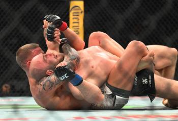 Grant Dawson s'impose par soumission face à Mateusz Rebecki au terme d'un affrontement riche en rebondissements | UFC 328